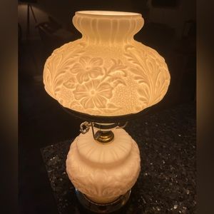 Milk glass lamp, this was originally candle lit, my grandfather changed to elec